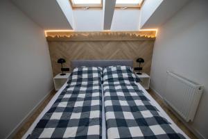 Posteľ alebo postele v izbe v ubytovaní 25 Wisła by BonzApart