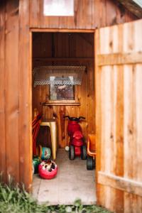 a toy house with some toys in it at Chalupa U Ceďora in Petrovičky