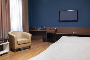 Sjónvarps- og/eða afþreyingartæki á Golden Palace Hotel