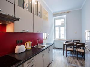 Kuchyň nebo kuchyňský kout v ubytování Lyra Apartments