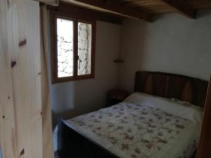 Ένα ή περισσότερα κρεβάτια σε δωμάτιο στο Casa Jeromine