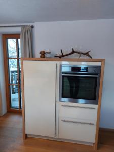 A kitchen or kitchenette at Försterhaus Még 10 kép