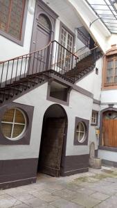 a building with a staircase and a stair case at Petit studio centre ville boucle in Besançon