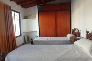 Кровать или кровати в номере Duplex Centrico/Costanera