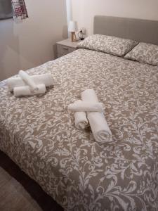 A bed or beds in a room at Una piccola bomboniera