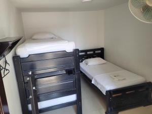 Hotel Palmeras De Mariana客房内的一张或多张床位