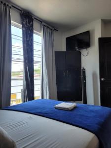 Hotel Palmeras De Mariana客房内的一张或多张床位