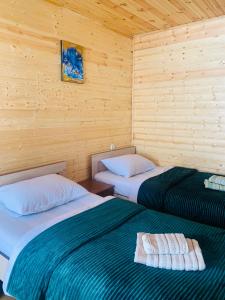 Postel nebo postele na pokoji v ubytování guesthouse NENO