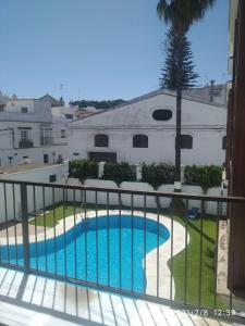 Bazén v ubytovaní Dúplex centro, climatizado, garaje, piscina, WIFI alebo v jeho blízkosti