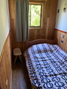 Cama o camas de una habitación en Cabaña Casa piedra