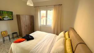 Ліжко або ліжка в номері Itea Home