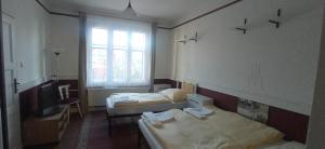 Postel nebo postele na pokoji v ubytování Altes Haus