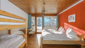 Ένα ή περισσότερα κρεβάτια σε δωμάτιο στο Apartment auf dem Schlossberg - Bergblick