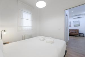 Giường trong phòng chung tại Calle Avila, zona Cuatro Caminos - Bernabeu