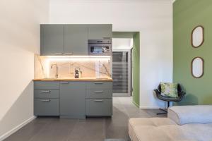 a kitchen with a sink and a counter at Menton Casino in Menton