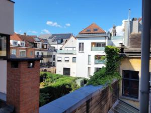 a view from the balcony of a building at Cathedral view apartment in Antwerp