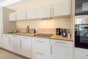 Köök või kööginurk majutusasutuses Physacap Suites & Villas