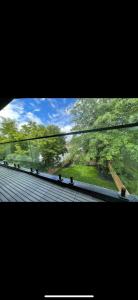 a view from a window of a roof with trees at 6 BEDROOM MODERN AND LUXURY HOME in Welland