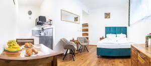 Postel nebo postele na pokoji v ubytování Luxusní studio v resortu v srdci Krkonoš + 24 fotografií