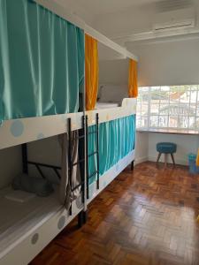 Morada City Hostel客房内的一张或多张床位