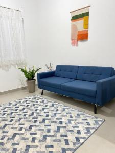 Χώρος καθιστικού στο Aconchego! Sua casa com Piscina em Passos!!