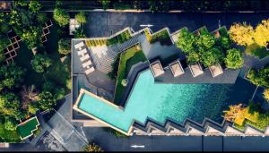 an overhead view of a pool in a park at the edge central holiday inn new in Pattaya Central