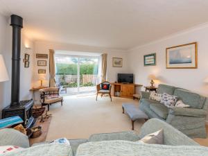 a living room with a couch and a fireplace at 2 bed in Bognor Regis 79283 in Bognor Regis