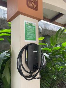 a charging box with a wire attached to it at LOFTSCACAO APARTMENTS, Villas Cacao, near to Playa Bonita Limón in Portete