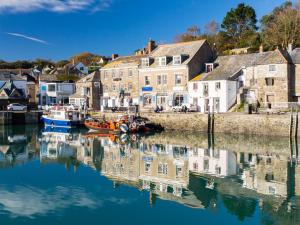 a view of a harbor with boats in the water at 1 Bed in Padstow 75736 in Saint Ervan