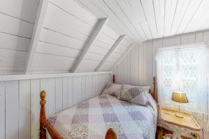 Postel nebo postele na pokoji v ubytování Gingerbread Dream