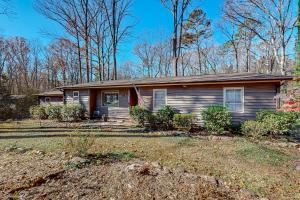 a house with an american flag in a yard at Nantahala in Seneca