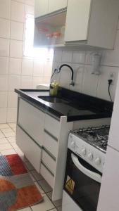 Ett kök eller pentry på Apartamento - Salvador BA