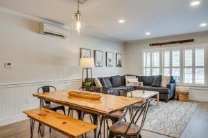 a living room with a table and a couch at Ski-InandSki-Out Cranmore Mountain Resort Condo! in Conway