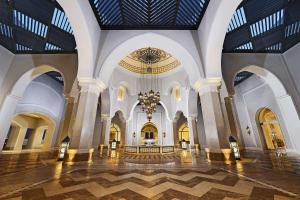 a large lobby with a chandelier in a building at Steigenberger Alcazar in Sharm El Sheikh