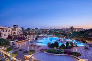 an overhead view of a swimming pool at a resort at Steigenberger Coraya Beach - Adults Friendly 16 Years Plus in Coraya Bay +37 photos