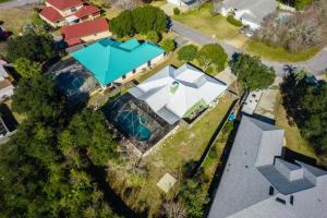 an overhead view of a house with a pool at Sea-renity Home in Sunnyside