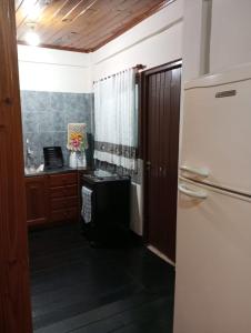 Kuchyň nebo kuchyňský kout v ubytování Departamentos Florida + 8 fotografií