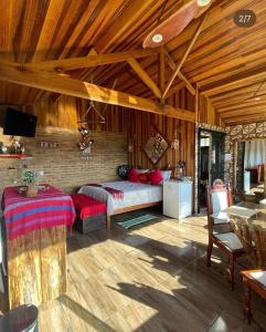 TV a/nebo společenská místnost v ubytování Pousada Rancho da Montanha