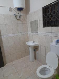 Kúpeľňa v ubytovaní Chidenguele