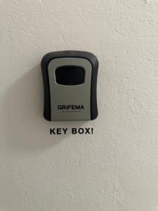 a key box on the wall of a room at DATRI Petite Suite 10 in Vienna