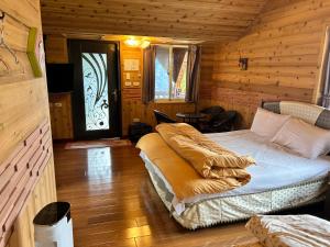 Postel nebo postele na pokoji v ubytování Lala Mountain San hao Manor
