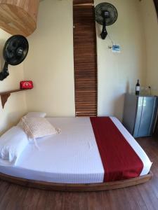 Postel nebo postele na pokoji v ubytování Ecorali Lodge