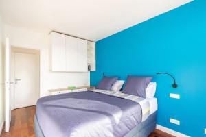 Postel nebo postele na pokoji v ubytování Comfortion Le Papillon - Appartement de luxe avec vue et piscine + 12 fotografií