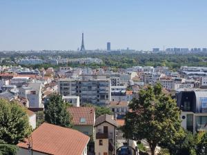Nespecifikovaný výhled na destinaci Puteaux nebo výhled na město při pohledu z apartmánu