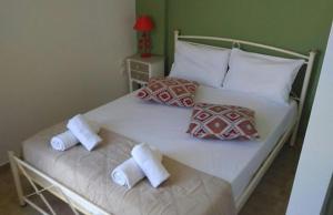 Postel nebo postele na pokoji v ubytování Markora Rooms