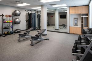 a gym with cardio equipment and tread machines at Courtyard by Marriott Decatur in Decatur