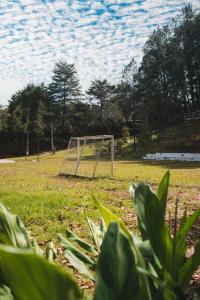 a soccer goal in the middle of a field at flowers in Medellín