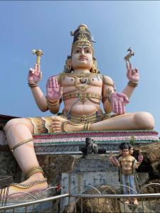 a large statue of a woman sitting on top of a building at Hostel Lali beach villa in Trincomalee +6 photos