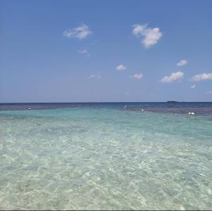 a view of the ocean from the beach at Hostel Lali beach villa in Trincomalee