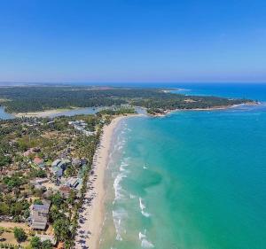 an aerial view of a beach and the ocean at Hostel Lali beach villa in Trincomalee